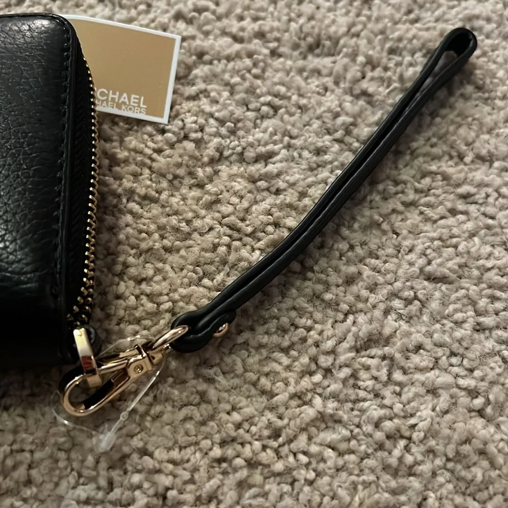 Michael Kors questions leave